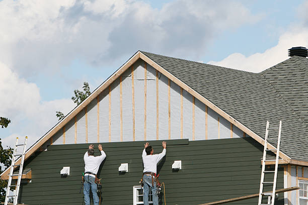 Professional Siding Installation technician working in Bellevue, WA